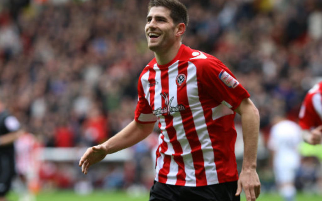 Sheffield United's Ched Evans celebrates scoring s goal in 2012.