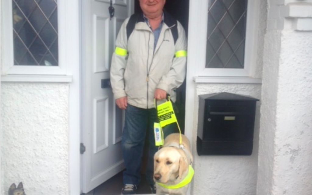 Mr Sheridan with Mia, his guide dog.