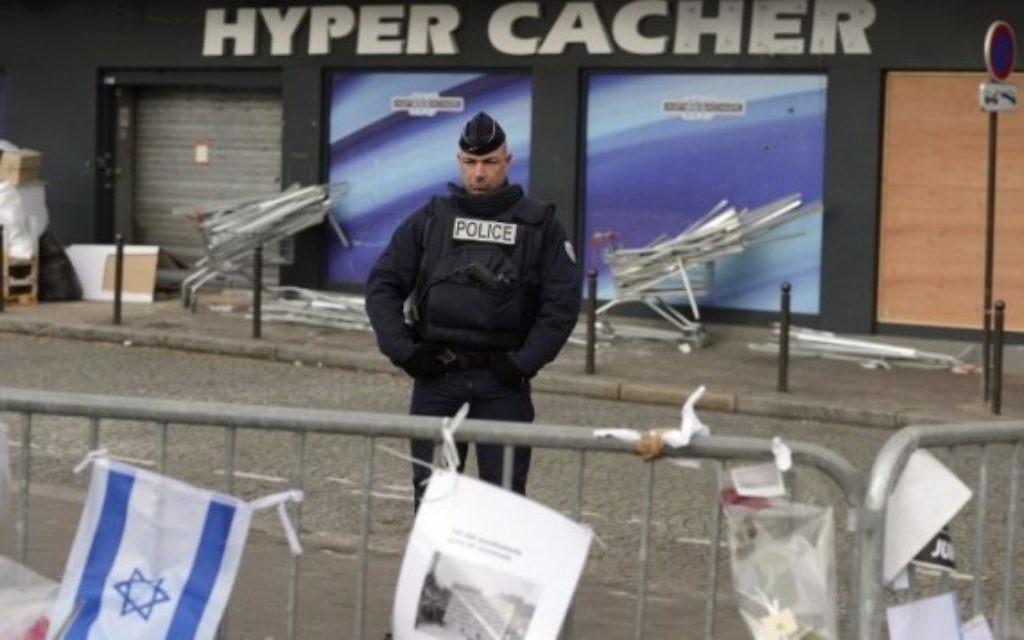 A man has been arrested in Paris after trying to burn the Israeli flag outside the kosher shop where four Jews were killed by a jihadist last month.