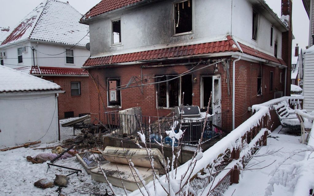 The scene of the Brooklyn house fire that claimed seven lives.
