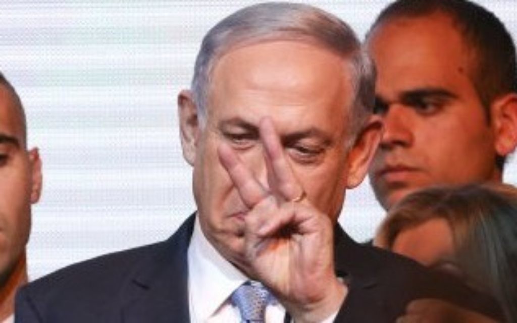 Israeli Prime Minister Benjamin Netanyahu greets supporters In Tel Aviv.