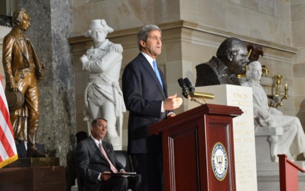 U.S. Secretary of State John Kerry delivers remarks at the dedication of a bust of Winston Churchill at the U.S. Capitol in Washington, D.C., on October 30, 2013. The bust is being placed pursuant to H. Res. 497, which was authored by House Speaker John Boehner and passed the House shortly before the 70th anniversary of Churchill's wartime address to a joint meeting of Congress.