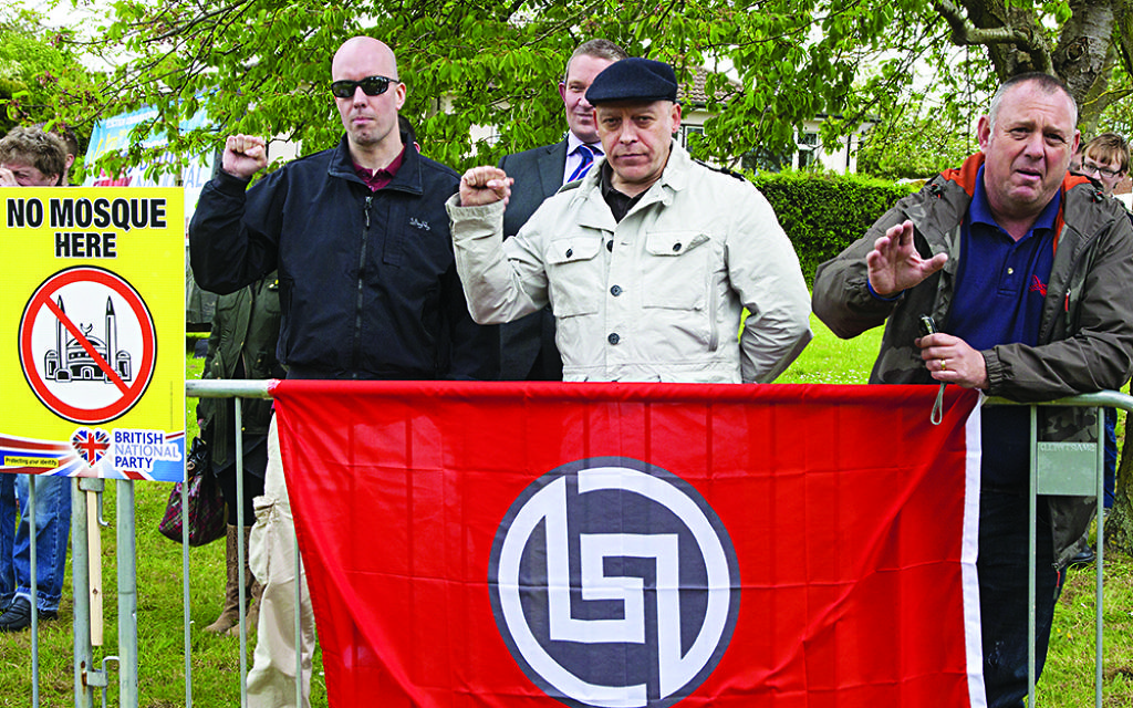 Piers Mellor [left] and Eddie Stampton [centre] from neo-Nazi group New Dawn  were behind a planned neo-Nazi march in Golders Green
