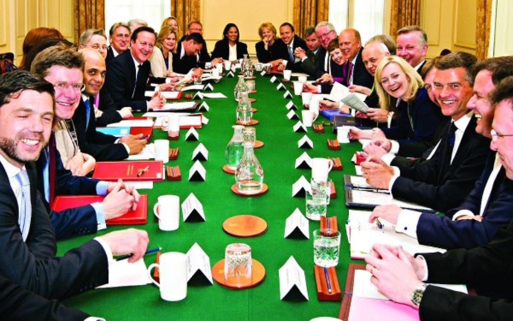 Prime Minister David Cameron hosts the first cabinet meeting with his new cabinet in Downing Street in London, following his General Election victory.