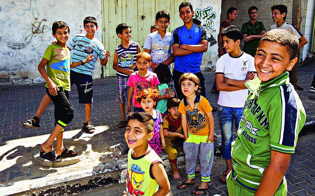 Children pictured on a street of Gaza City. Photo: Jens Buettner/dpa