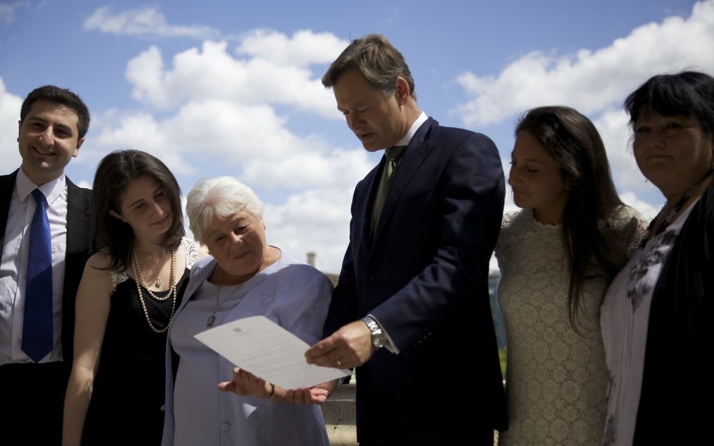Barbara and her family, with Matthew Offord MP
