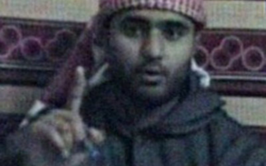 A TV grab taken from a video tape attributed to Al-Qaeda aired by the Qatar-based Al-Jazeera TV channel shows a man alleged to be Mohammad Sidique Khan, one of the bombers of last July's devastating attacks in London, outlining the reasons for his action, 01 September 2005. Sidique Khan, a 30-year-old British national of Pakistani origin, was named as one of the four suicide bombers who killed 52 people in coordinated attacks in the British capital. Grabbed by Guardian picture desk credit Al Jazeera