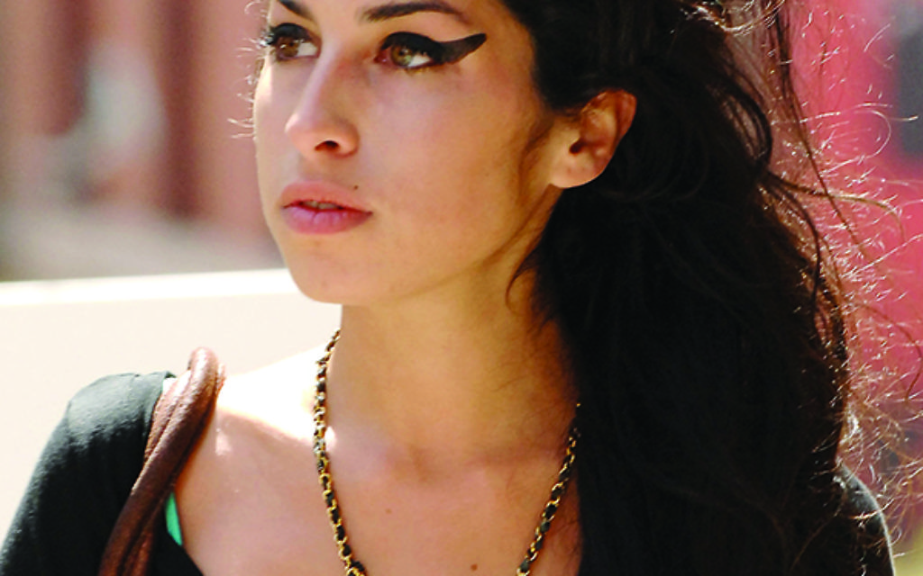 Mandatory Credit: Photo by Startraks Photo/REX (661742c)
Amy Winehouse strolling through Soho
Amy Winehouse out and about in New York, America - 01 May 2007