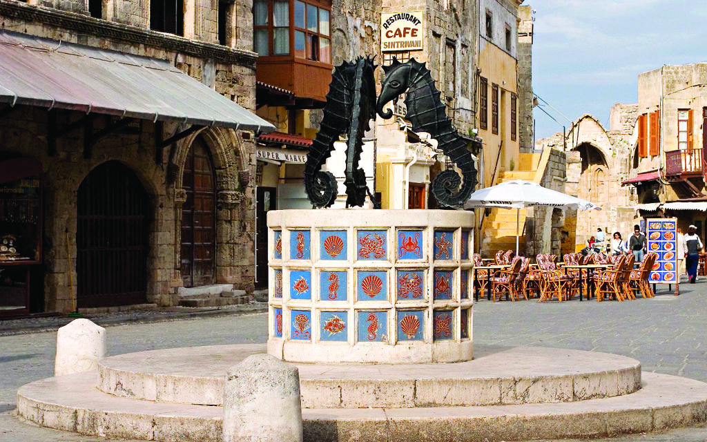 Ancient buildings and this historic fountain are among the many glimpses of a colourful past that can be seen on a visit to Rhodes