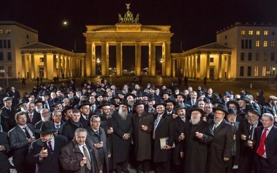 European rabbis gather in Germany, with the famous Brandenburg Gate in the background.. Source: the Conference of European Rabbis Facebook page