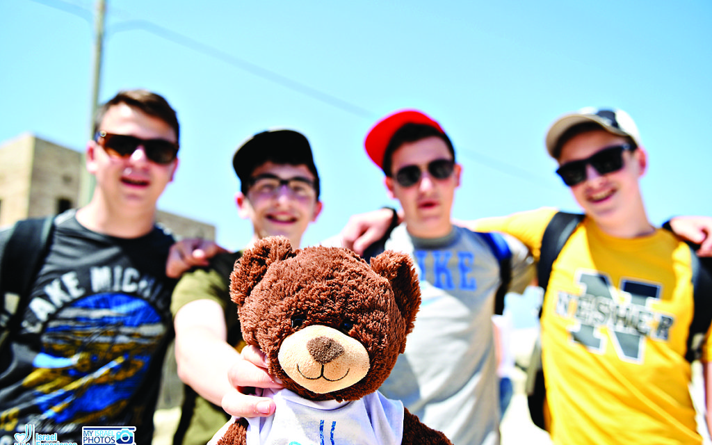 Bnei Akiva Tour 4 pose in Israel with tour member number 1,146 – or ‘Ted’