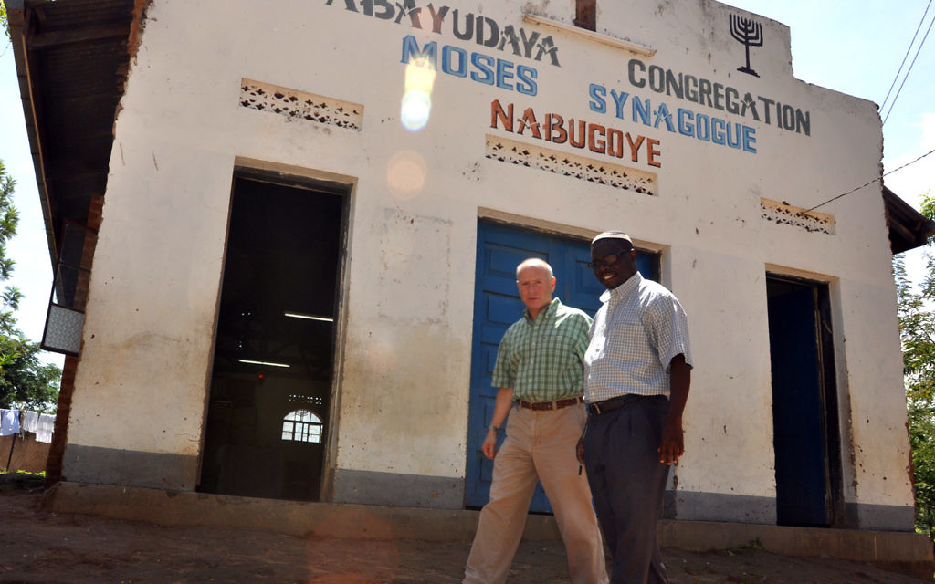 Mbale, Uganda Ñ (Jun 4, 2011) Combined Joint Task Force-Horn of Africa Chaplain and Religious Affairs Director (U.S. Navy Captain) Jon Cutler walks with Rabbi Gershom Sizomu at the Moses Synagogue, Abayudaya. (U.S. Air Force photo by Lt Col Leslie Pratt)