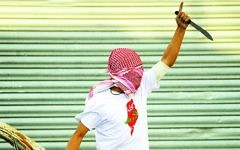 A Palestinian demonstrator raises a knife, during clashes with Israeli police, in Shuafat refugee camp in Jerusalem,, Oct. 2015. (AP Photo/Mahmoud Illean) A Palestinian demonstrator raises a knife, during clashes with Israeli police, in Shuafat refugee camp in Jerusalem,, Oct. 2015. (AP Photo/Mahmoud Illean)