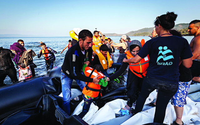 IsraAid in Greece helping refugees.