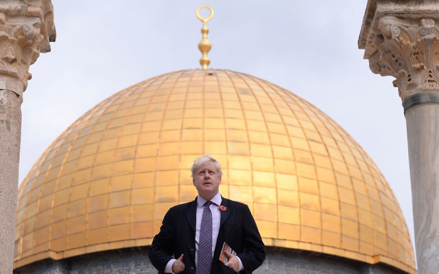 Boris Johnson stands in front of the Dome of the Rock during a visit to Temple Mount/Haram al Sharif in Jerusalem, Israel. (Photo credit: Stefan Rousseau/PA Wire)