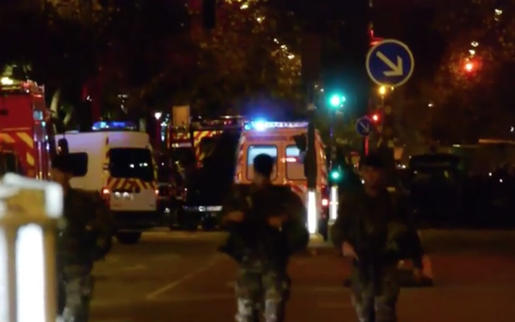 Paris was dominated by police cars and  as it descended into a state of emergency