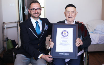 Marco Frigatti, Head of Records for Guinness World Records, presented Israel Kristal his certificate of achievement for Oldest living man on 11th March 2016, Haifa, Israel. 

Picture credit: Dvir Rosen/Guinness World Records
