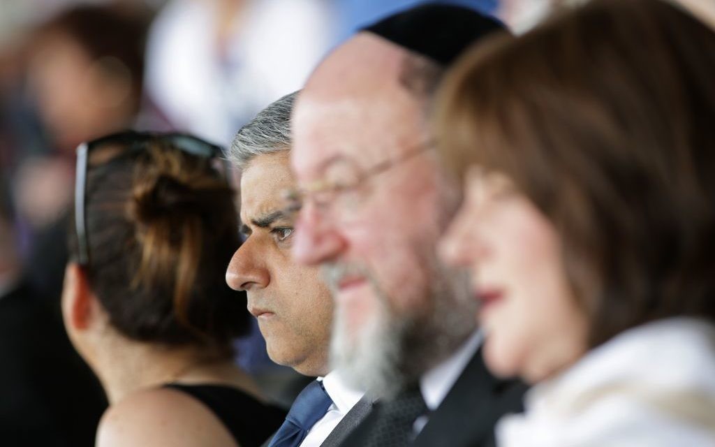 Watching the commemoration in the company of the Chief Rabbi