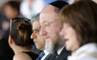 Watching the commemoration in the company of the Chief Rabbi