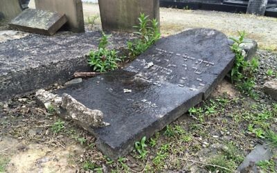 Officers said 14 gravestones were smashed and destroyed at the city's Blackley Jewish Cemetery.