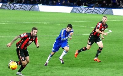 A.F.C. Bournemouth players in action against Chelsea in Blue