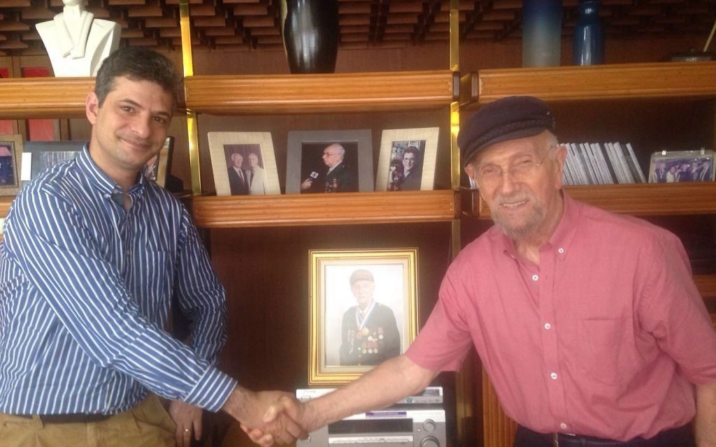 Jeremy Havardi with Izak Kimelblat, who was awarded medals from five countries for his heroics