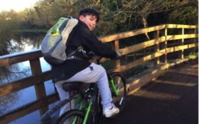Joshku Gunusen on his bike, which helped him rise thousands