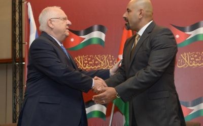 President Rivlin (left) embracing the Jordanian ambassador to Israel 

Photo credit  Mark Neyman/GPO