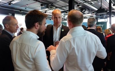 Jonny Benjamin (left) and Neil Layborn (right) speaking with Prince William