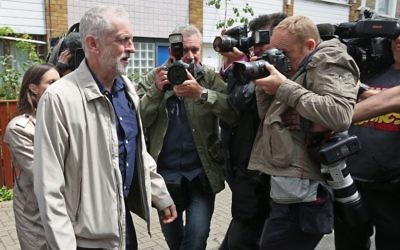 Labour leader Jeremy Corbyn leaves his house in London following a series of damaging resignations. (Photo credit: Isabel Infantes/PA Wire)