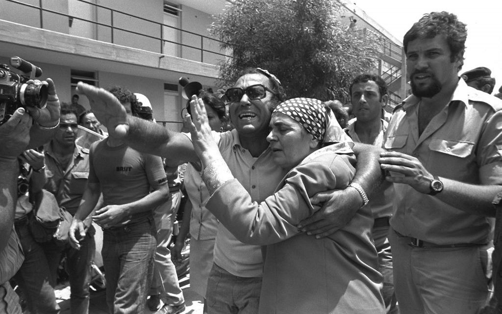 An emotional family reunion after the return of the hijacked Air France passengers from Entebbe.