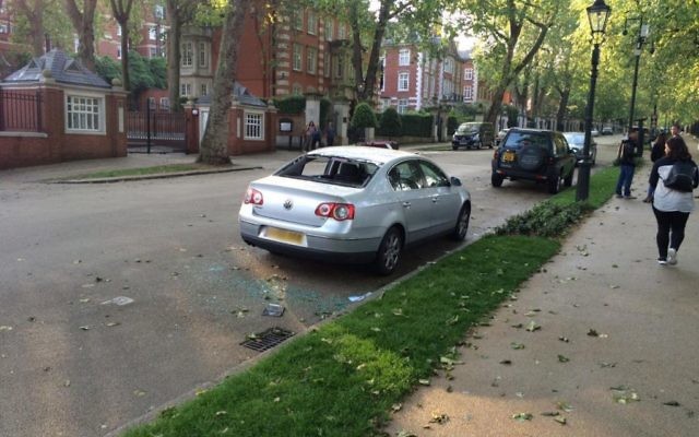 The car following the explosion opposite the Israeli embassy. [Picture: Twitter]