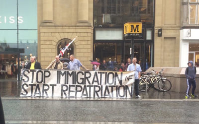 National Front demonstrators hold up a sign 'stop immigration start repatriation' following the Brexit vote.