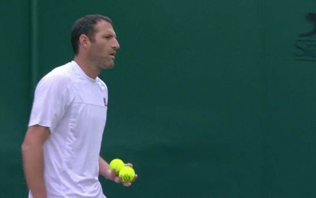 Jonathan Erlich is out of the men's doubles competition.