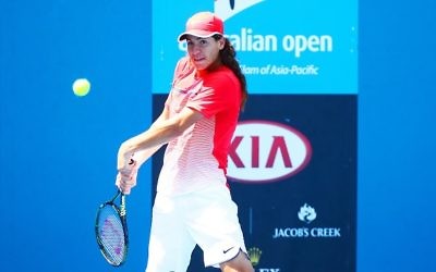 Yshai Oliel is through to the second round of both singles and doubles competition