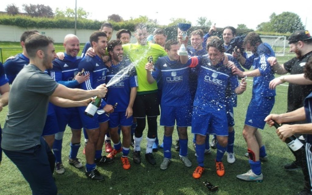 Redbridge B celebrate their win