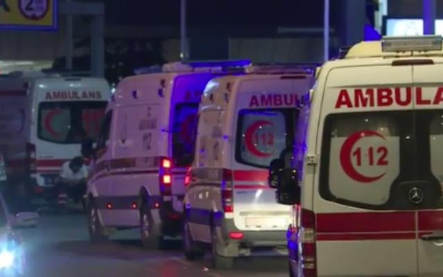Ambulances outside the airport tending to the injured (Screenshot from youtube)