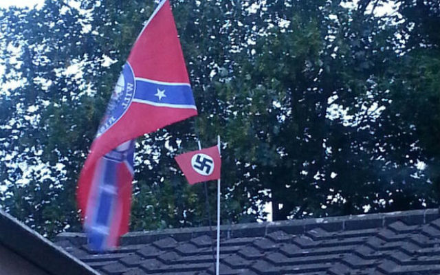The Nazi flag mounted on the confederate flag, which has since been removed (Source: Phil Norris of Gloucestershire Live)