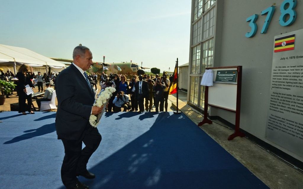Benjamin Netanyahu lays a wreath to mark 40 years since Entebbe in Uganda ( JINI Photo Agency, LTD) Benjamin Netanyahu lays a wreath to mark 40 years since Entebbe in Uganda ( JINI Photo Agency, LTD)