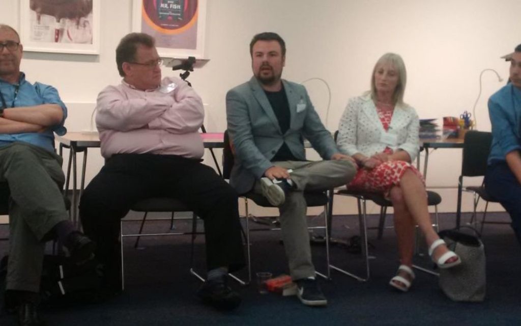 Jewish councillors discussing topics during the event
