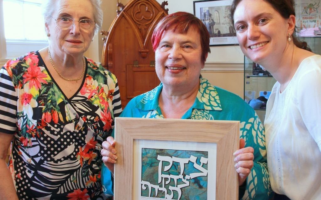 Janet (centre) with SLLS president Louise Freedman and chair Alice Alphandary