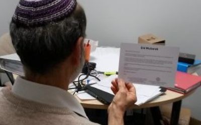 Rabbi Jonathan Wittenberg of Masorti Judaism reading an Eid Card