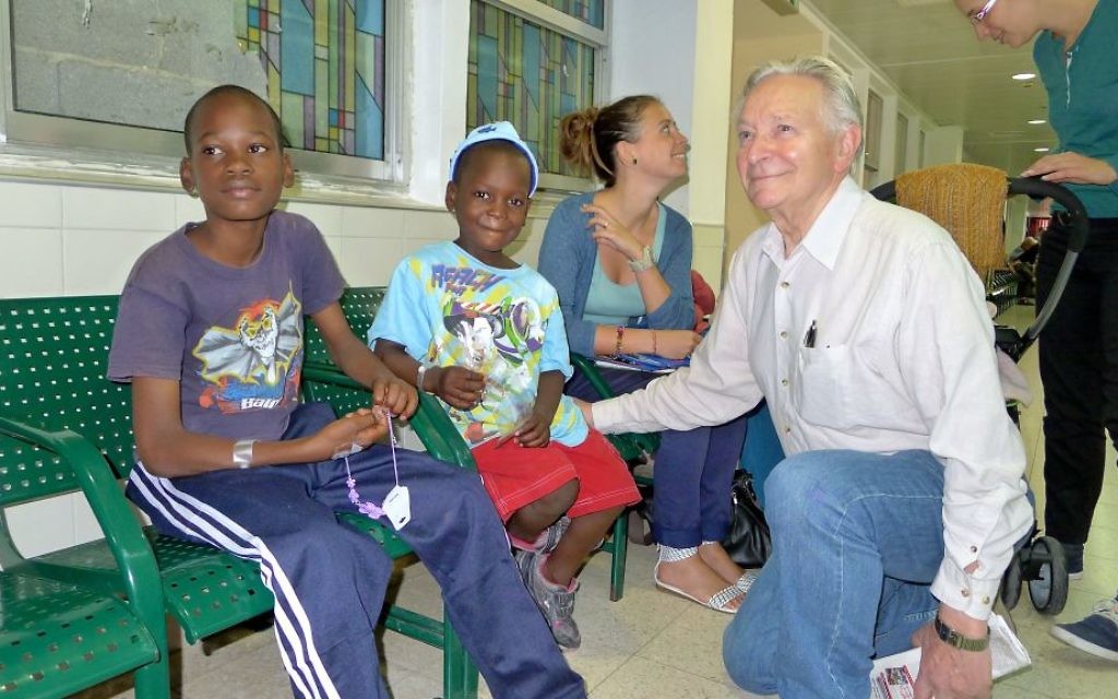 Walter at the Wolfson Medical Centre in Holon with a couple of the kids