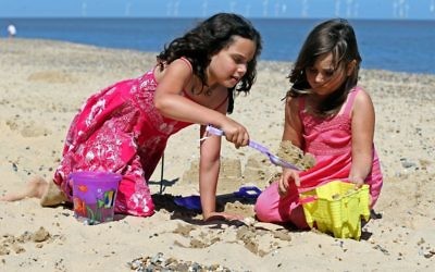 Kids enjoying the sunshine on the beach