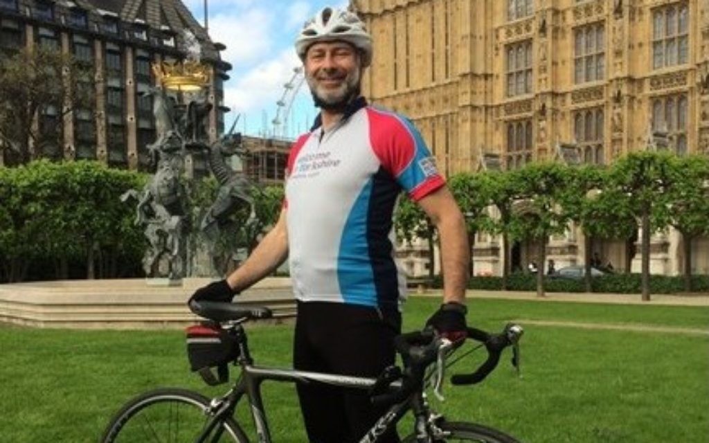 Fabian Hamilton MP outside parliament with his bike