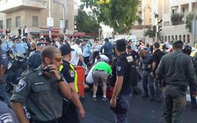 Emergency services rushed to treat the victims of the homophobic attack in Jerusalem last year