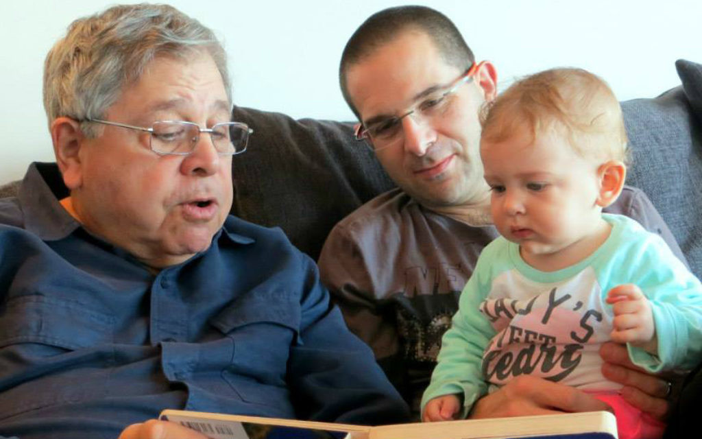 Micah Lakin Avni pictured with his late father Richard before last year’s attack