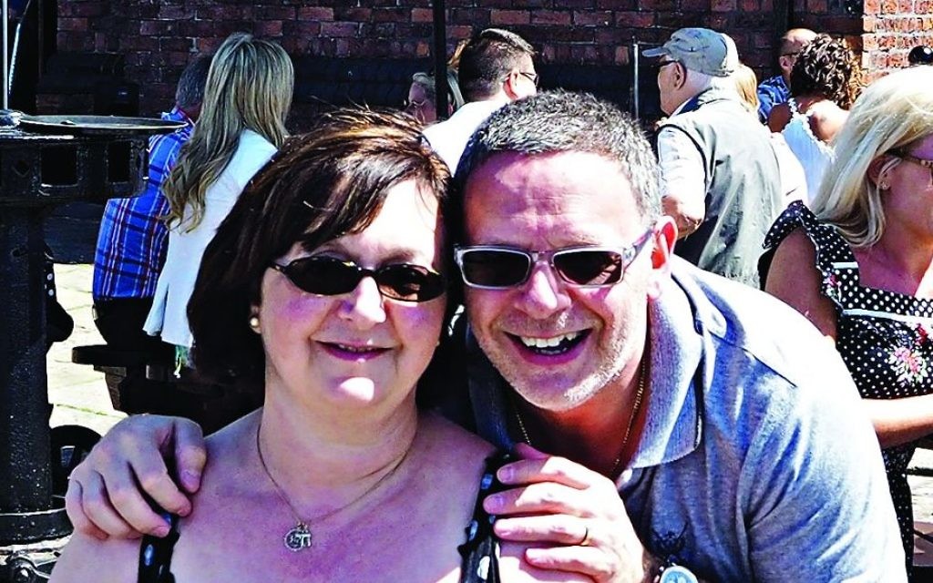 Michael Shogger, 55 pictured wit his wife