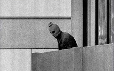 A  masked terrorist on top of the balcony during the Munich massacre of 1972