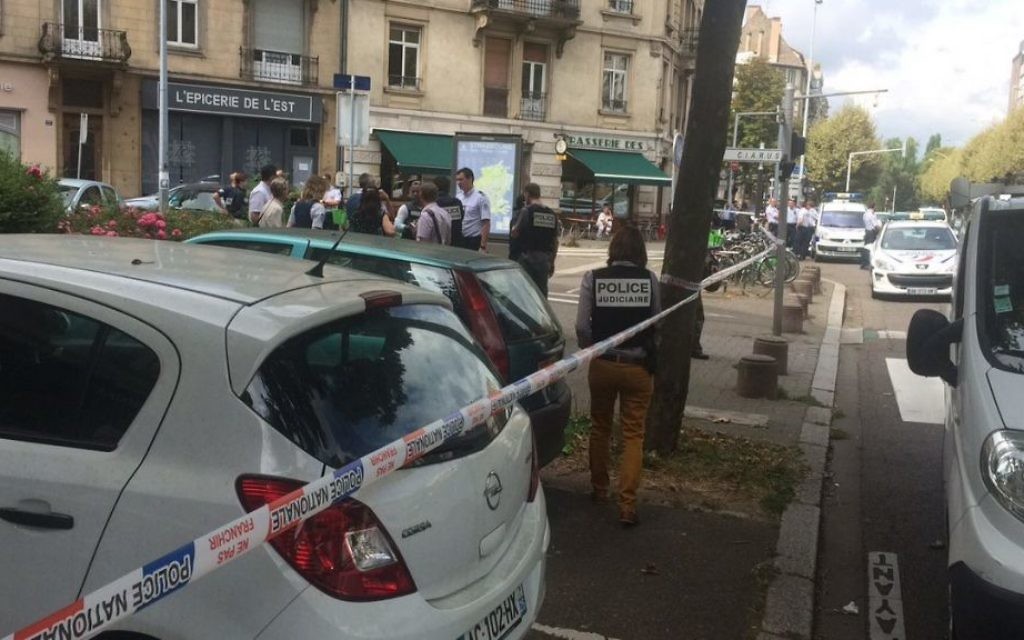 Police cordon off the area where the stabbing is reported to have taken place